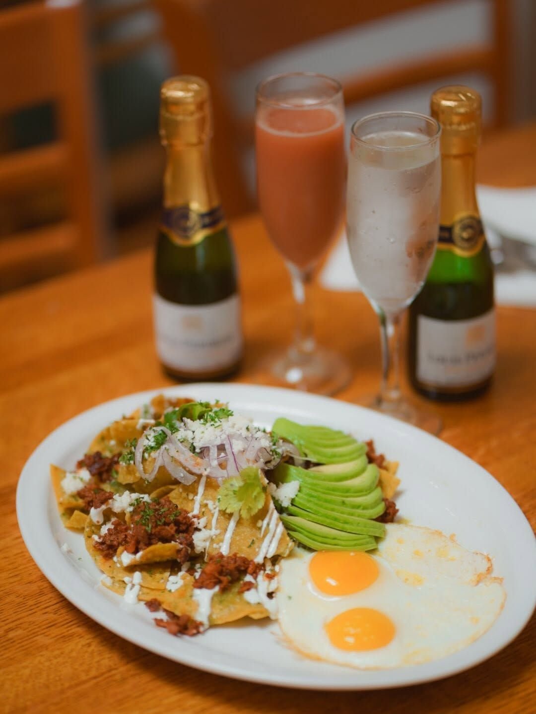 Chilaquiles with avocado and mimosas